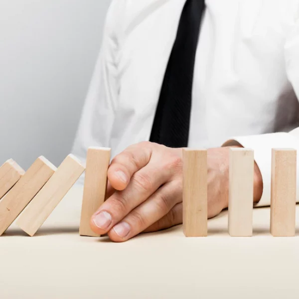man-stopping-wooden-pieces-fall-concept_23-2148546920 man-stopping-wooden-pieces-fall-concept_23-2148546920
