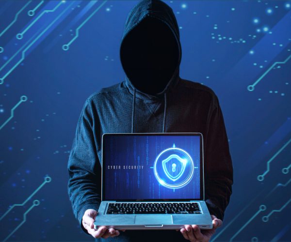 medium-shot-man-with-hoodie-holding-laptop medium-shot-man-with-hoodie-holding-laptop