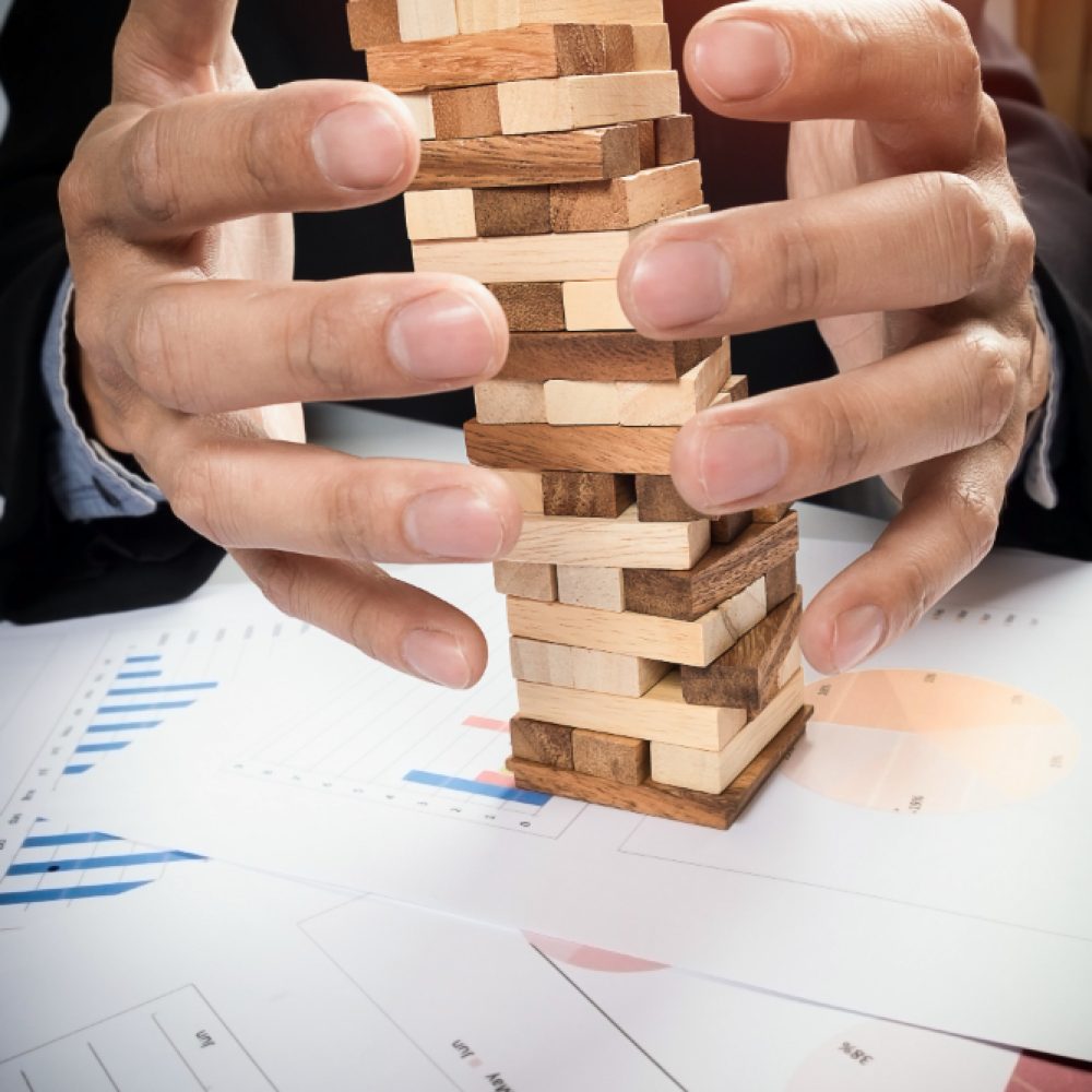 planning-risk-strategy-business-concept-businessman-gambling-placing-wooden-block-tower planning-risk-strategy-business-concept-businessman-gambling-placing-wooden-block-tower